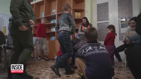 Pit Bull Comforts Children in Ukraine Traumatized by War