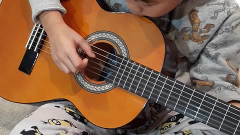 Ethan Plays Guitar