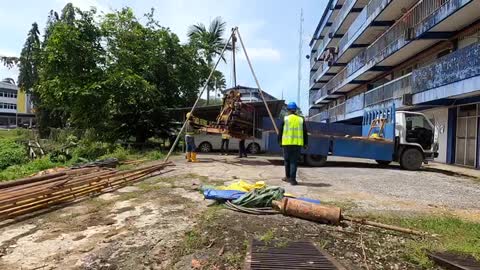 Lifting borehole machine from the lorry ( Soil investigation)