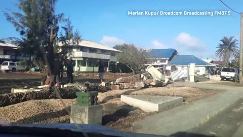 Footage shows ash on ruined Tonga buildings