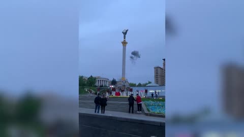 Crowd cheeringas drone shot down over central Kyiv | AFP