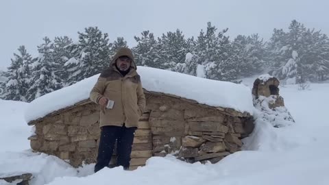 Survival Shelter from Stones - Winter Camping in Heavy Snow - Bushcraft, Building a Primitive House