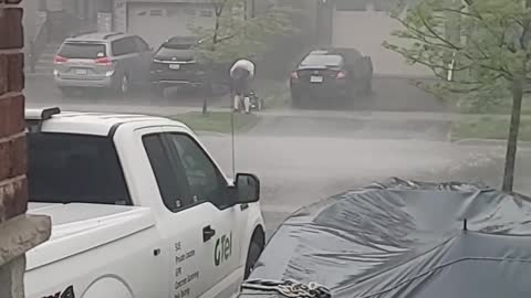 Determined Dude Cuts Grass During Derecho Storm