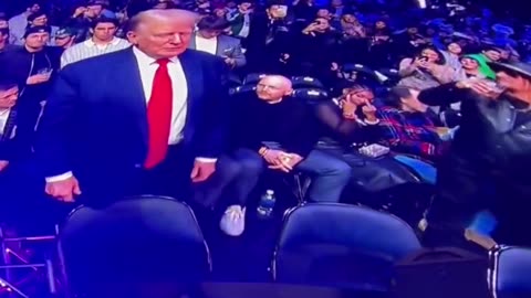 So, pretty sure that’s Bill Burr’s wife flipping off Donald Trump at the UFC