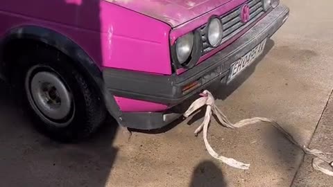 Cleaning an old car that has been in the warehouse for a long time