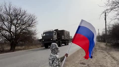 Bogdan, 9, goes out every day to raise the morale of Russian soldiers