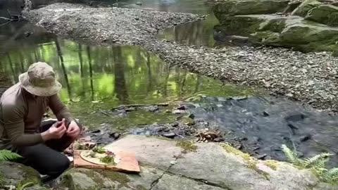 Transforming a fresh catch into a masterpiece under the open sky #OutdoorCooking