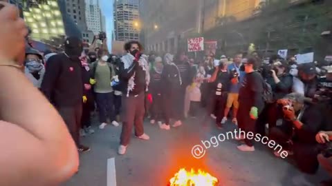 BREAKING: Violent Liberal Protestors Burn American Flag Outside DNC