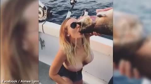 Bikini Girl Video Excitement When Drinking Beer From Dead Fish Mouth