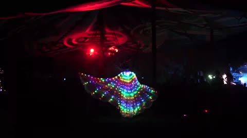 Man dancing in a lit-up costume_batch