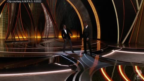 Will Smith smacks Chris Rock on stage at the Oscars