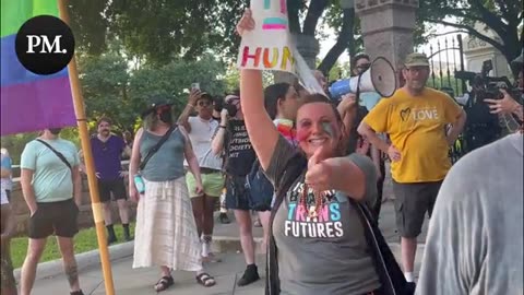 AUSTIN, TX— LGBTQ activists disrupt the Let Women Speak event at the state capitol.