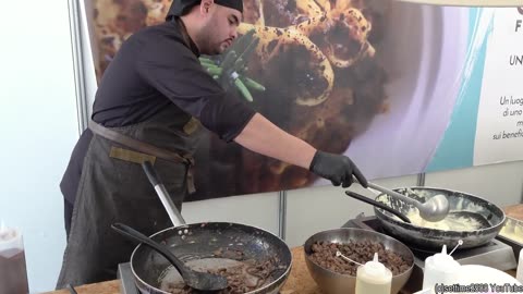 Chocolate Spaghetti with Wild Boar Ragout, Italy Street Food. Chocolate Festival