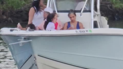 Blue Crew Lady at Black Point Boat Ramp vertical