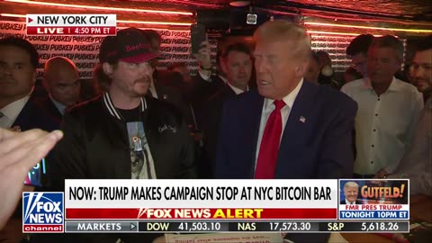 Watch Trump makes transaction with Bitcoin at NYC bar