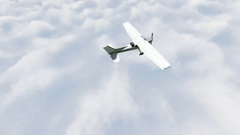 White plane flying above the clouds