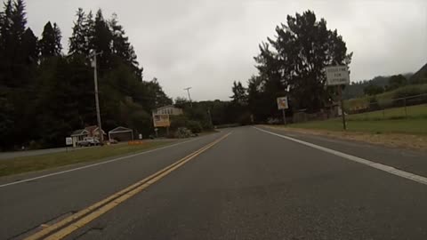 Unbelievable Harley ride through a giant Redwood tree