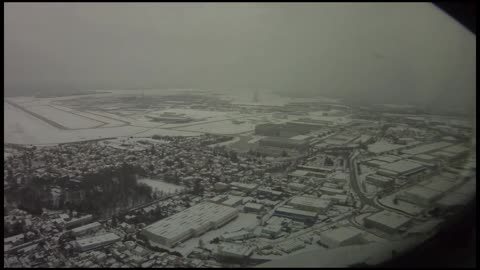 Paris sky View in snow while landing