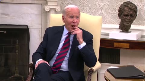 Biden Barks at Reporters.