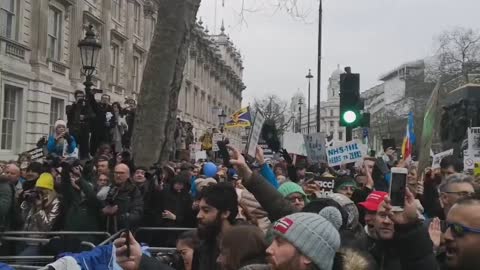 BREAKING:NHS Staffs Protest aginst mandate by throwing uniforms at the police outside Downing Street