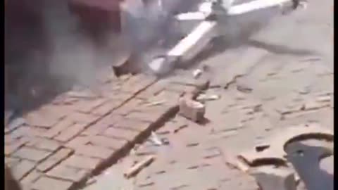 Here are Muslims destroying the cross and one of several churches