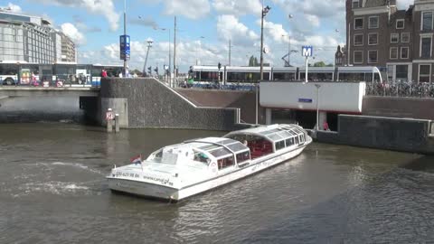 Netherlands Amsterdam canal boat rotating turn