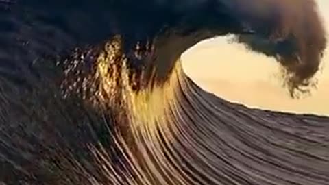 Perfect wave touching the clouds