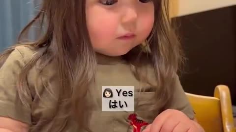 Japanese girl learning English gets the giggles