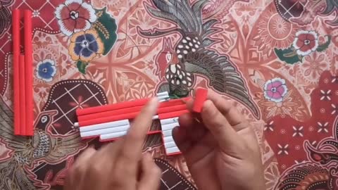 origami paper gun - how to make origami paper guns - can shoot