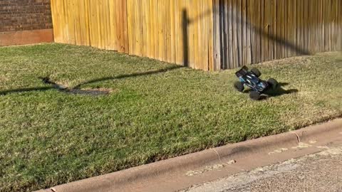 RC Car Absolutely Sends it Up Big Ramp Jumping Over Flag