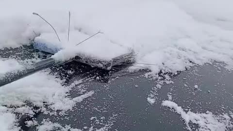 Cleaning The Snow Off Typical MidWest Weather