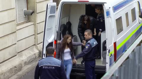 Andrew Tate and brother Tristan arrive at court in Romania