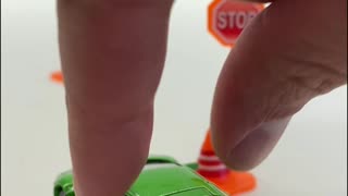 Toy Cars Driving in Reverse