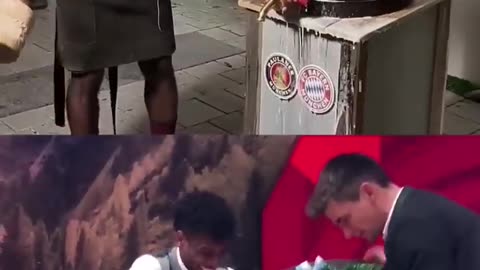 Kingsley Coman taps the beer barrel