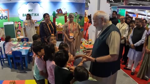 pm modi recieves warm hug from a child