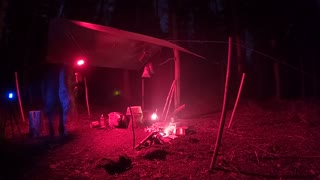 GoPro. Night lapse. Campfire undernath a tarp. Woodland wildcamping