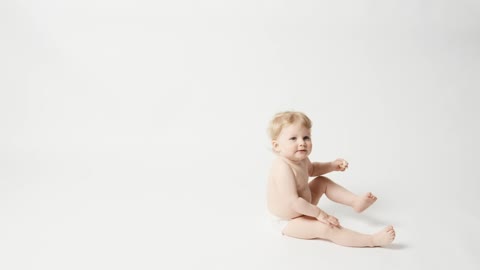 mixkit-baby-girl-in-photo-studio-8482-large