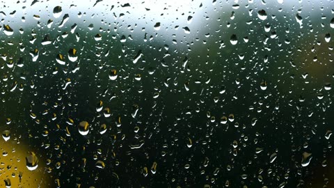 Gentle rain sounds on window