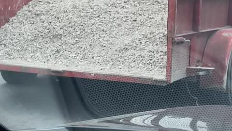 Guy Comments on Trailer Full of Gravel