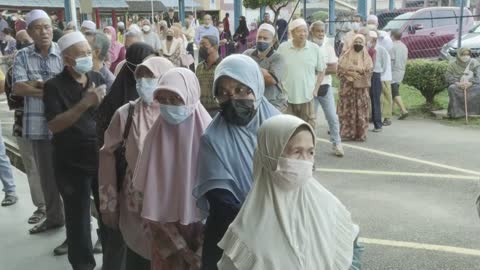 Polls open in Malaysia's tightly contested election