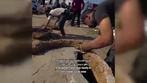 Palestinian family builds a clay oven amidst the challenging circumstances