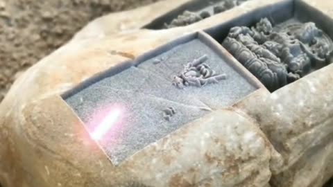 laser technology existed back then to engrave stones with images