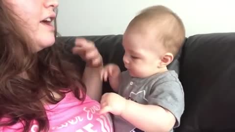 Adorable baby emotional reaction to mother singing