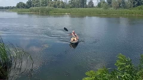 Camping. Rowing in a kayak.