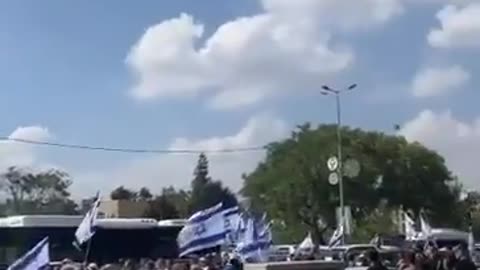 Thousands of people line the roads of Jerusalem to pay their last goodbye to