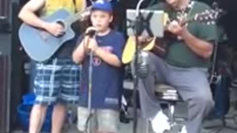 Larry Watson and grandson Noah Watson sing The thunder rolls