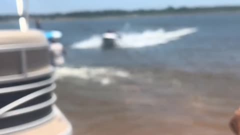 A Man NFL Blocks A Jetski