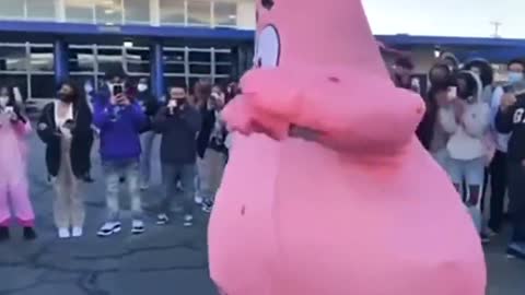 Patrick Star and Among Us Guy face off in a duel on Halloween