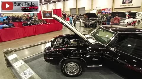 InSane Chevy Camaro Z28 302 V8 black 1969 at World of Wheels car show 2024