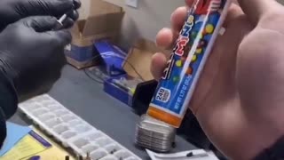 The Old Hot Dog in the Candy Container Trick